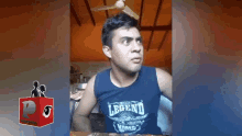 a man is wearing a blue legend shirt