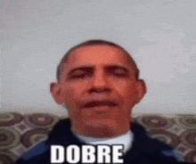 barack obama is sitting on a couch making a funny face and saying dobre .
