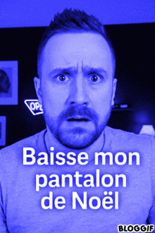 a man with a surprised look on his face and the words baisse mon pantalon de noel written below him