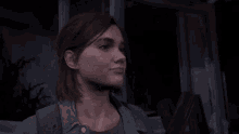 a woman in a video game is making a face and giving the middle finger .