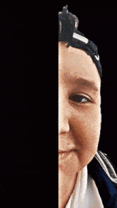 a close up of a child 's face next to a picture of a blue car