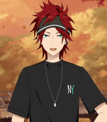 a boy with red hair wearing a ny t-shirt