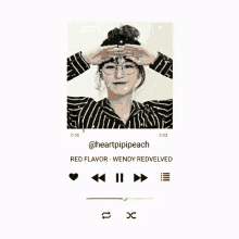a woman wearing glasses and a striped shirt is playing a music video .
