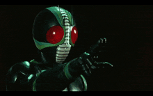 a masked superhero with a glowing letter j behind his head