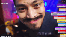 a man 's face is displayed on a screen that says subgoal fnaf at the bottom