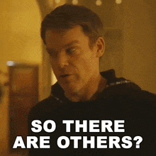 a man in a black hoodie is asking if there are others .