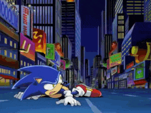 sonic the hedgehog is laying on the street in a city