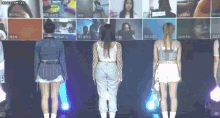 a group of women are standing in front of a screen with a grid of pictures and the words honeycam.org visible