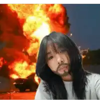 a woman with a beard stands in front of a fire