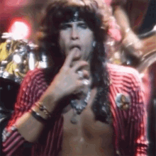 Finger Licking Aerosmith GIF - Finger Licking Aerosmith Let The Music Do The Talking Song GIFs
