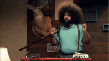Comedy Bang Bang Reggie Watts GIF - Comedy Bang Bang Reggie Watts Boom GIFs