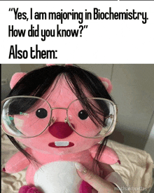 a stuffed animal wearing glasses and a caption that says " yes , i am majoring in biochemistry "