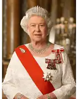 queen elizabeth wearing a white dress with a red sash around her waist