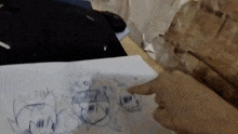a person is pointing at a drawing that says scp
