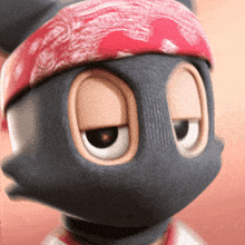 a cartoon character wearing a bandana and a mask
