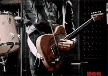 Jimmy Page Guitar God GIF - Jimmy Page Guitar God Violin Bow GIFs