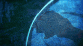 a silhouette of a person 's face is visible in a dark blue background