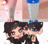 a boy and a girl are standing next to each other holding a cup with stars on it