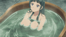 a girl is taking a bath in a wooden tub