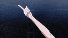 a girl with purple hair and red eyes is pointing up with her finger