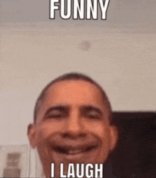 barack obama is making a funny face and laughing while taking a selfie .
