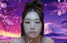 a woman in front of a purple background with cherry blossoms and a mountain