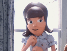 a cartoon doll is standing in front of a window and looking out .