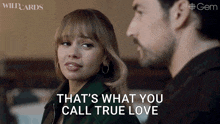 a man and a woman are looking at each other and the woman is saying that 's what you call true love