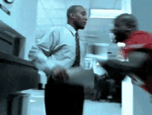 Terry Tate Office Linebacker GIF - Terry Tate Office Linebacker Filing Cabinet GIFs