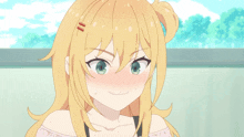 a girl with blonde hair and blue eyes is making a funny face