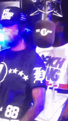 a man wearing a black shirt with 88 on it