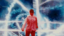 a man in a red shirt and sunglasses is standing in front of a glowing background .