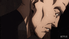 a close up of a man 's face with a netflix logo on the bottom right