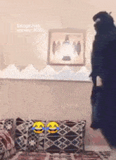 a man is standing in a room with a picture on the wall and a snapchat filter .