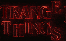 a red sign that says " stranger things " on it
