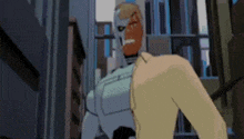 a man in a suit is standing next to a robot in a city .