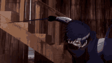 a man in a mask is standing in front of a wooden wall with a sword
