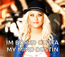a picture of a woman wearing a hat with the words im bored outta my mind dustin