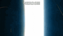 a white light is coming out of a dark room and the words nerds are written on it .