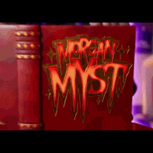 a red book that says morgan mystic on the cover