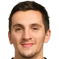 a close up of a man 's face with a smile on his face