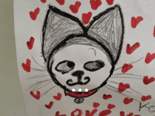 a drawing of a cat surrounded by red hearts with the words love written below it
