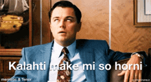 a man in a suit and tie is sitting on a couch with the words kalahti make mi so horni