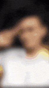 a blurred image of a person 's face with a white border