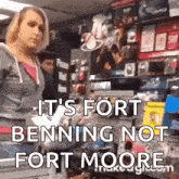 a woman is standing in a store with the words `` it 's fort benning not fort moore '' written on her face .