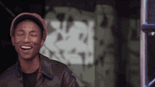 Pharrell Laughing GIF - Laugh Lol Pharrell Williams GIFs