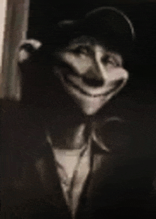 a black and white photo of a man in a suit and tie with a clown face on his face .