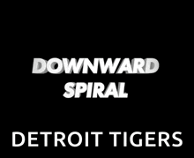 a black background with the words downward spiral and detroit tigers