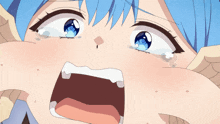a close up of a girl with blue hair crying