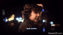 a blurry image of a person with the website makeagif.com visible in the corner